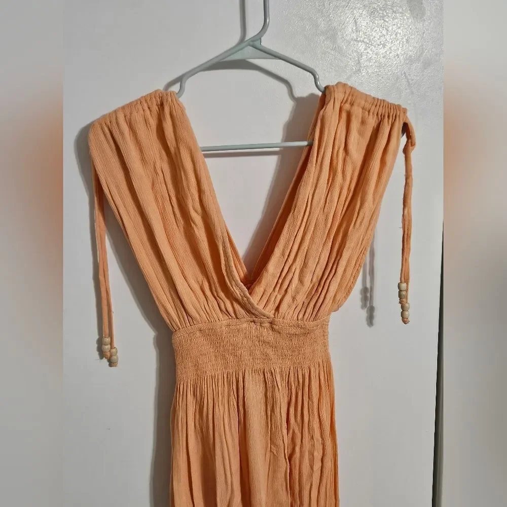 FREE PEOPLE 'WAITING FOR THE SUN TRIANGLE JUMPSUIT Size XS